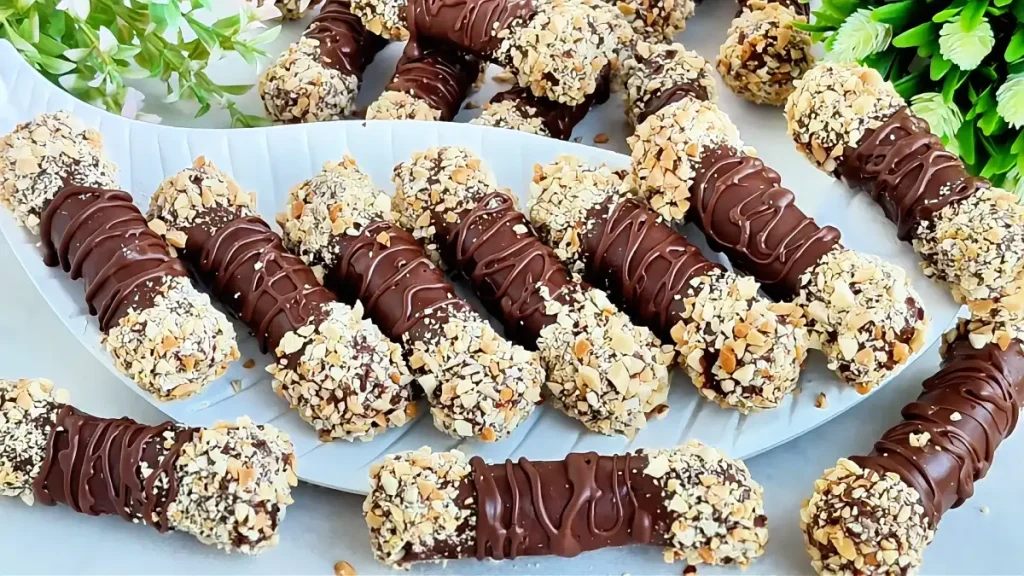 Finished Chocolate Peanut Prune Rollers served on the plate